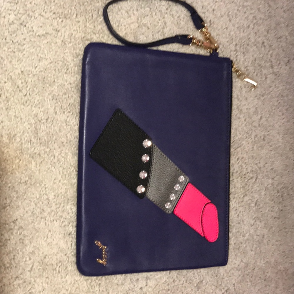 An authentic RARE Juicy Couture clutch